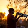 best kenya safari for photographers - wildlife photographer in open vehicle, Masai Mara