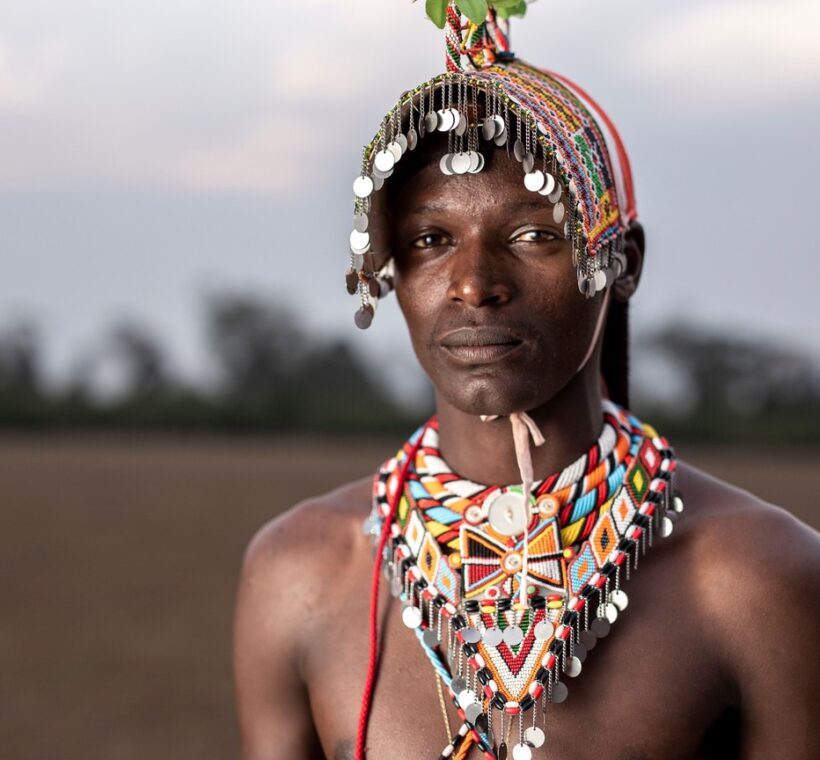 kenya diaspora heritage tour -- parent and child at Maasai Mara at golden hour