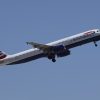 Kenya Airways London Heathrow flight: wide-body long-haul passenger jet climbing after takeoff against a clear sky, representative of the Nairobi to London route