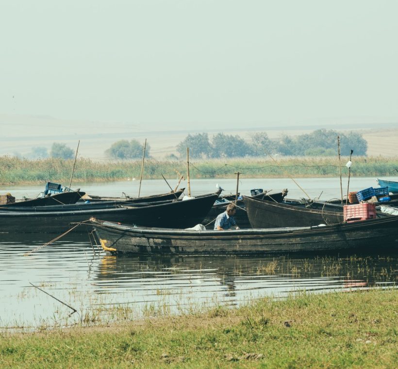Fishing boats on Lake Victoria at sunset near Kisumu, Kenya