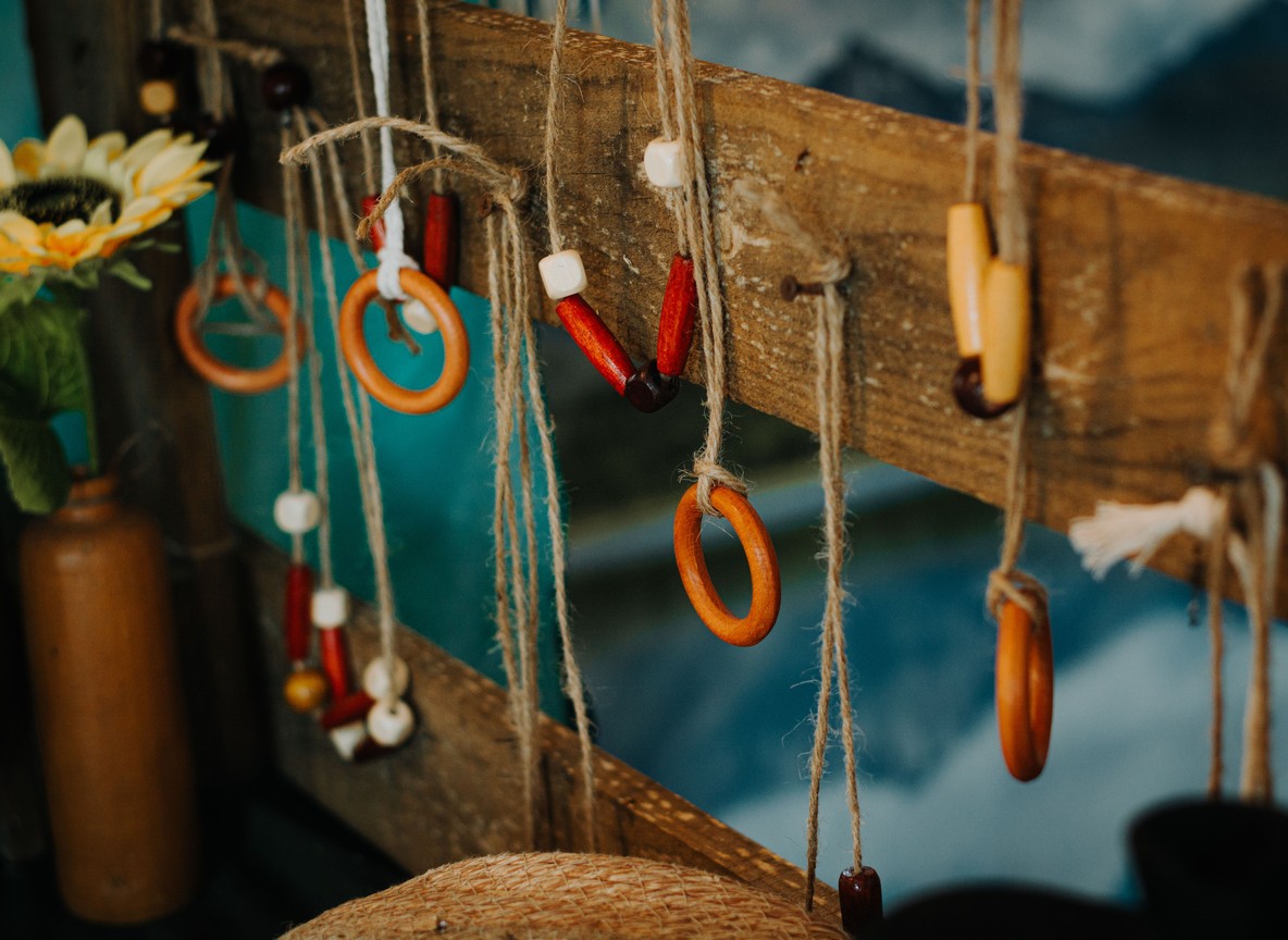 Traditional Maasai beadwork and carved wooden crafts displayed at a Nairobi market stall