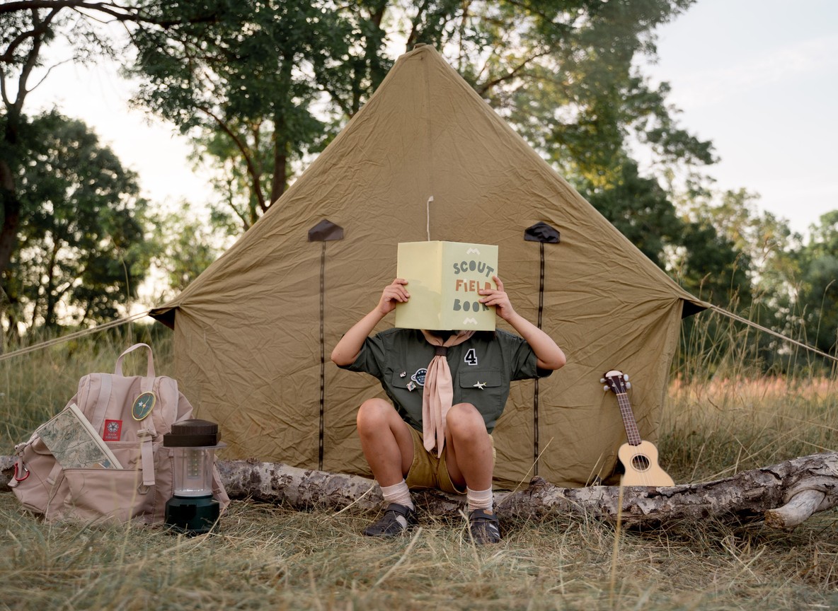 Camp staff and dining tent in a Kenya bush setting