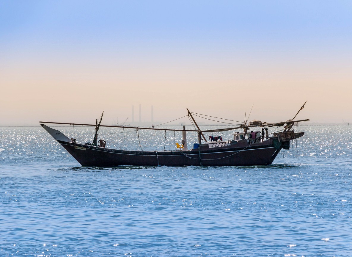 Traditional dhow sailing off the Kenya coast near Diani Beach